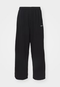 HARRI WIDE LEG JOGGER UNISEX - Teplákové kalhoty - black