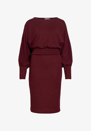 Bordeaux rode gebreide jurk met lange ballonmouwen, ronde hals, getailleerde taille en knielange rok. Zachte textuur met een gladde afwerking.