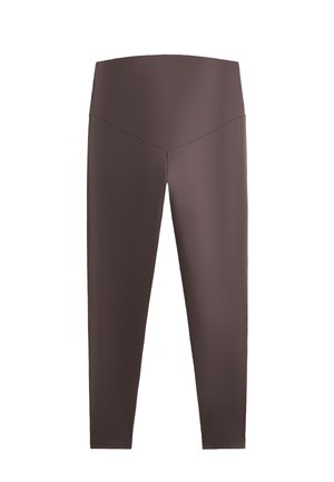 Leggings maro cu talie înaltă, cu o textură netedă, picioare conice și un design al taliei în formă de V. Fără modele sau accente vizibile.