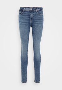 Smala jeans i blå denim, med fem fickor, frontknäppning och subtila blekningar för textur.