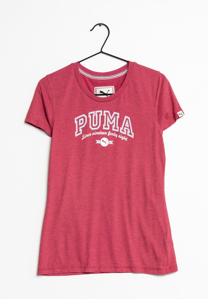 Camiseta de algodón roja con mangas cortas, cuello redondo, que presenta un logo impreso en blanco de "PUMA" y el texto "Desde mil novecientos cuarenta y ocho".
