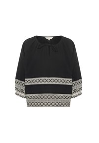 Zwarte blouse met een ronde halslijn en strikdetail. Heeft witte geborduurde patronen aan de onderkant en mouwen. Lichtgewicht stof.