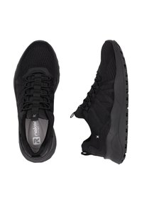 Black athletic shoes with mesh and synthetic upper, textured surface, padded collar, and thick rubber outsole featuring lugs for traction.