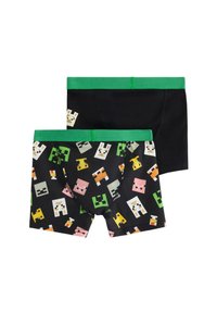 Kaksi paria poikien bokserihousuja: yksi täysin musta vihreällä vyötärönauhalla, toinen musta värikkäillä pikselöidyillä hahmoilla ja vihreällä vyötärönauhalla.