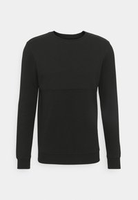 Svart sweatshirt med långa ärmar, rund halsringning, texturerad övre panel och enfärgad nedre del. Muddar vid ärmslut och nederkant.