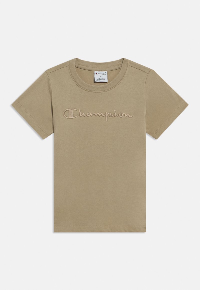 Μπεζ βαμβακερό t-shirt με κοντά μανίκια και στρογγυλή λαιμόκοψη. Διαθέτει κεντητό λογότυπο "Champion" σε πιο ανοιχτή απόχρωση μπροστά.