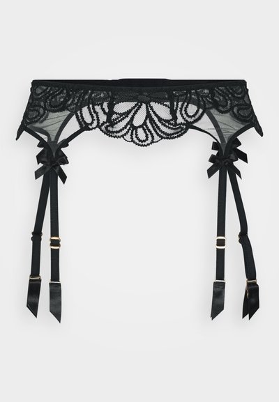 Garter belt en dentelle noire avec motif floral et texture transparente. Doté de nœuds en satin et de sangles réglables, rehaussé de quincaillerie dorée.