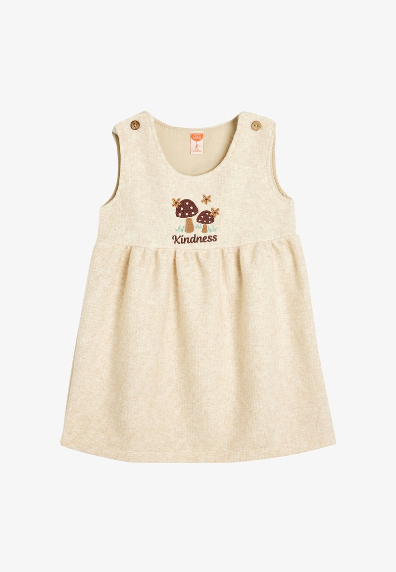 Beige bomulls-klänning med en utsvängd kjol, prydd med svamp- och blommembroderi samt ordet "Vänlighet." Inkluderar två axelknappar.