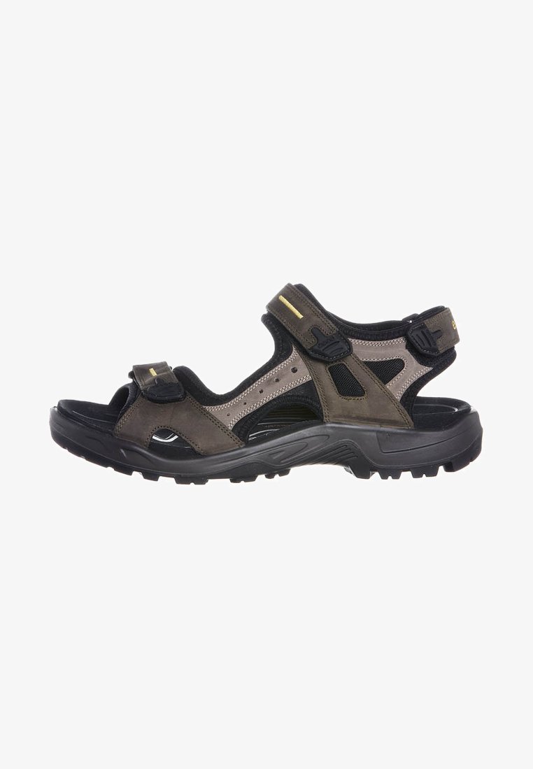 Sandalo da esterno marrone e nero con cinturini regolabili in Velcro, suola in gomma, dettagli in rete e soletta ammortizzata per il comfort.