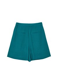 Shorts en lin teal avec une taille haute, des jambes larges et deux poches à l'arrière. Finition avec des coutures propres et sans matériel visible.