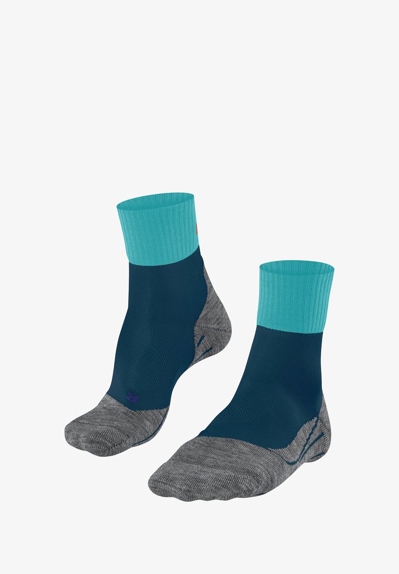Chaussettes de sport avec une bordure côtelée turquoise, un corps bleu foncé et un coussin de pied gris. Présente des motifs texturés et des sections renforcées au niveau du talon et des orteils.