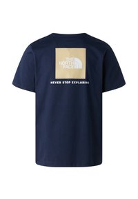 Marineblå bomulds t-shirt med et kvadratisk logo i guld og hvidt, der præsenterer "THE NORTH FACE" og teksten "NEVER STOP EXPLORING" nedenfor.