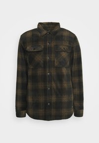 Veste-chemise à carreaux verts foncés et marron avec manches longues et deux poches poitrine boutonnées à l'avant.