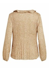 Blusa beige con un design plissettato, maniche lunghe e un colletto morbido. Presenta un motivo a pois marroni sparsi su tutto il tessuto.