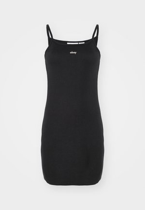 Zwarte geribde tankjurk met verstelbare spaghetti bandjes en een klein wit "obey" logo op de borst. Gladde textuur en aansluitend ontwerp.