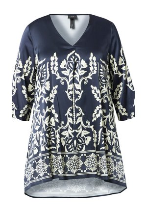 Marineblaue Tunika mit weißen, filigranen Blumen- und Blattmustern, V-Ausschnitt, dreiviertellangen Ärmeln und einem etwas längeren Rückensaum.