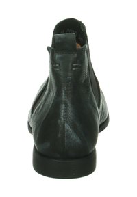 Schwarze Leder- ankle boots mit glatter Oberfläche, abgerundeter Zehe, elastischen seitlichen Einsätzen und niedrigem Absatz. Mit Nahtdetails auf der Rückseite.