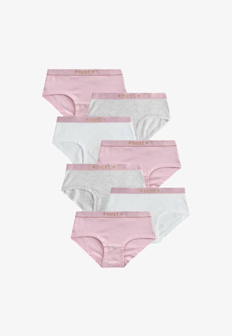 Sept paires de culottes en coton pour filles en rose, blanc et gris clair avec des ceintures roses indiquant "next" et comportant des symboles en forme de cœur.