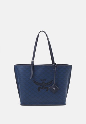 MCM LOONEY TUNES AREN MIT REISSVERSCHLUSS IN VISETOS - Shopping 