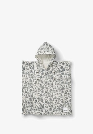 Blomstermønstret poncho med hætte i blødt hvidt stof. Har mørkeblå botaniske designs og to knapper foran.