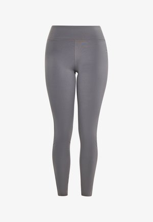 Leggings grises hechos de un material suave y elástico con una cinturilla alta y un ajuste ceñido, que presentan costuras mínimas y sin patrones visibles.