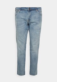 Light blue denim jeans with slim fit, classic five-pocket design, button closure, and subtle distressed details on the right thigh.