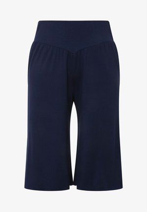 Námořnické modré kalhoty do zvonu s širokým elastickým pasem, s V-šitým předním švem, vyrobené z měkké, elastické tkaniny.