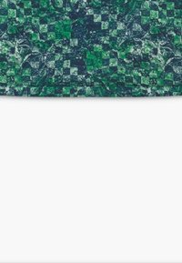 Green and navy patterned fabric featuring a textured checkerboard design with varying shades of green and subtle marbled accents.