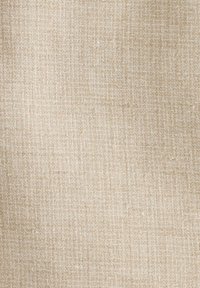 Tejido de un beige claro con un tejido texturizado, que presenta un patrón de cuadrícula. La superficie tiene un aspecto orgánico y natural, ideal para tapicería o manualidades.