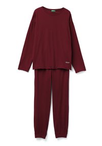 Conjunto de top de manga larga burdeos y pantalones a juego, confeccionado en un tejido suave, con un corte holgado y puños elásticos en los tobillos.
