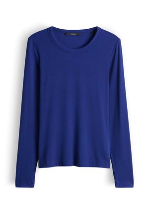 Haut à manches longues de couleur bleu vif, en tissu côtelé, avec un col rond et une coupe décontractée. Aucun motif ni accent visible.