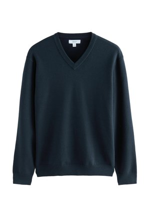 Ciemnoniebieski sweter w serek wykonany z miękkiej dzianiny, z długimi rękawami oraz ściągaczami przy rękawach i u dołu. Prosty, minimalistyczny design.