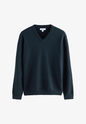 Ciemnoniebieski sweter w serek wykonany z miękkiej dzianiny, z długimi rękawami oraz ściągaczami przy rękawach i u dołu. Prosty, minimalistyczny design.