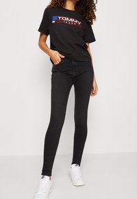 Tommy Jeans Jeans Skinny Fit - black denim