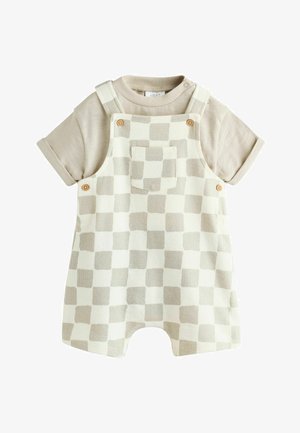 Beežid lühikeste varrukatega särk koos kreemja ja beežide ruuduliste lühikeste üleülikonnaga, millel on ees tasku ja puidust nupud.