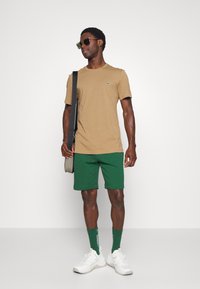 Lacoste - LIFESTYLE - Verryttelyhousut - vert Pienoiskuva 1