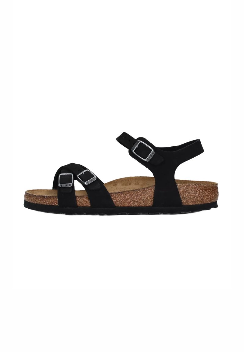 Zwarte suede sandalen met twee verstelbare banden, zilveren gespen en een kurken voetbed. Beschikt over een gestructureerde rubberen zool voor grip.