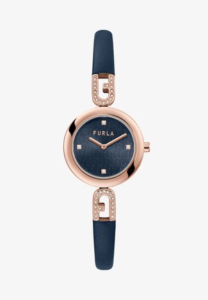 Marinblå läderarmbandsklocka med roséguldhardware, rund urtavla, präglad urtavla, kristallaccenter och logoplacering.