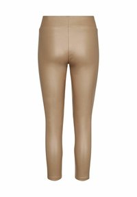 Rekbare, snug-fitting leggings in een lichte tan kleur. Gemaakt van een glad, glanzend materiaal met een hoge tailleband en geen zichtbare naden.