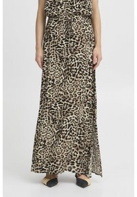 Jupe longue en tissu léger avec un motif léopard dans des teintes de marron et de noir. Comprend une taille élastique avec cordon de serrage.