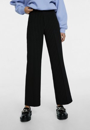 MIT STREIFENPRINT - Housut - black