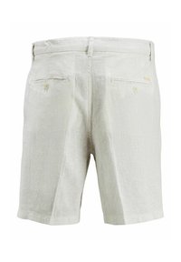 Shorts en lin de couleur claire avec un tissu texturé. Dotés de deux poches arrière avec boutons et d'une coupe droite.