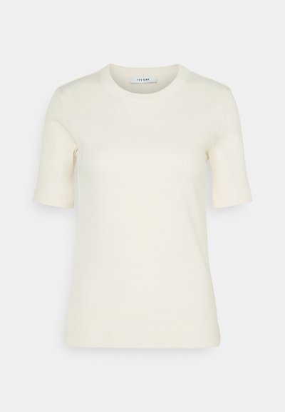 Cream short-sleeve T-shirt made of soft cotton, featuring a round neck, fitted shape, and minimalistic design with no visible patterns or accents.