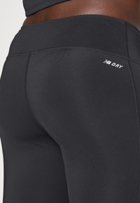 New Balance ACCELERATE - Leggings - black