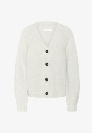 Bjela debela pletena kardigan s dugim rukavima i četiri velika crna gumba sprijeda.