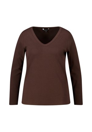 Dames top met lange mouwen in chocoladebruin, V-hals, nauwsluitend model en geribbelde textuur.
