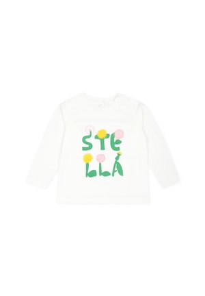 Camicia bianca a maniche lunghe con stampa floreale colorata e la parola "STELLA" in lettere verdi. Materiale in cotone morbido, dettaglio con bottone sulla spalla.