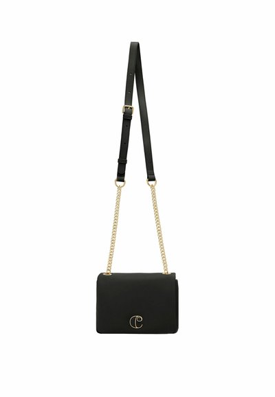 Black leather crossbody bag with a gold chain strap, featuring a rounded logo accent on the front and a smooth texture throughout.
