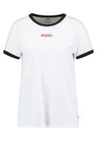 Bílý tričko s černým lemem na límci a rukávech, se červeným logem "LEVI'S" na přední straně. Měkká bavlněná tkanina.