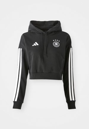 Sort cropped hoodie lavet af bomuld med snoretræk i hætten. Har hvide Adidas-striber på ærmerne og det tyske fodboldemblem på brystet.